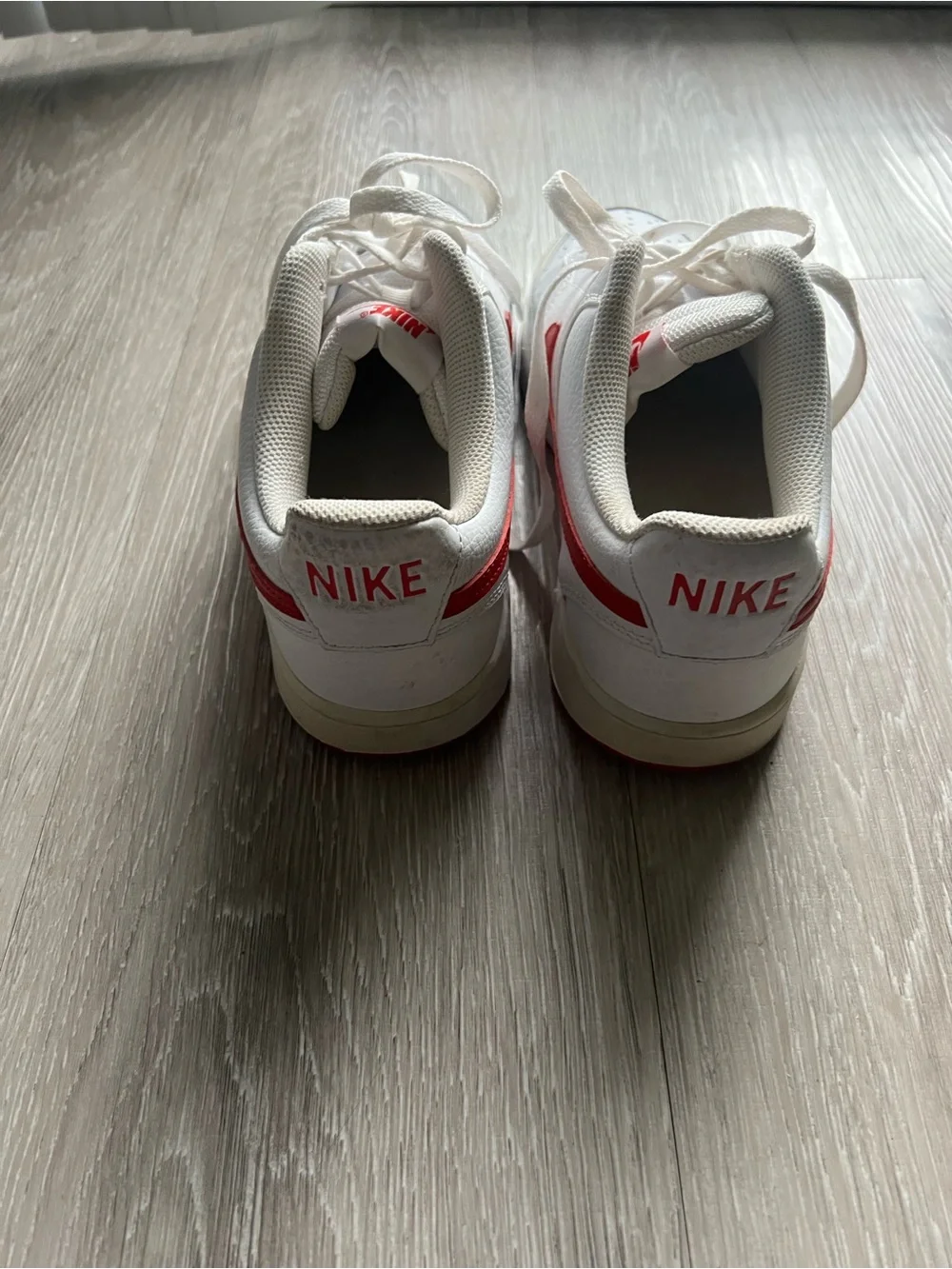 Nike Kids White Sneakers with Red Swoosh